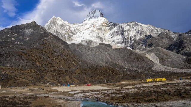 Ama Dablam mountain Time lapse with zoom towards summit on the Mount Everest trekking route, Himalayas, Nepal