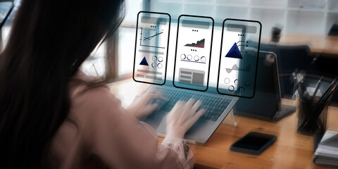Closeup of female ux developer and ui designer about mobile phone app interface in living room at...