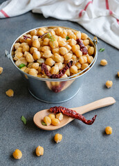 Popular homemade healthy snacks / Steamed Chickpeas with Dried Chili and Curry Leaves / Steamed to perfection, soft and tender, with a tinge of spiciness and curry leaf fragrant, add salt to taste