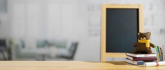 Education concept, 3D rendering, school elements on the table with books, stationery, doll, chalk board, and copy space