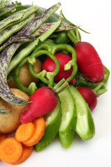 Fresh vegetables on a white background