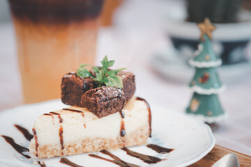 Piece of cake and decoration with piece chocolate brownies