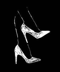White women's high-heeled shoes on a black background