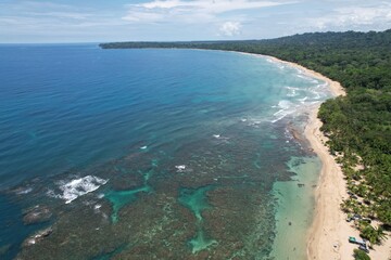 Fototapeta na wymiar Lush tropical Caribbean Coast of Limon in Costa Rica -aerial views of Cocles, Punta Uva, Playa Chiquita and Puerto Viejo 