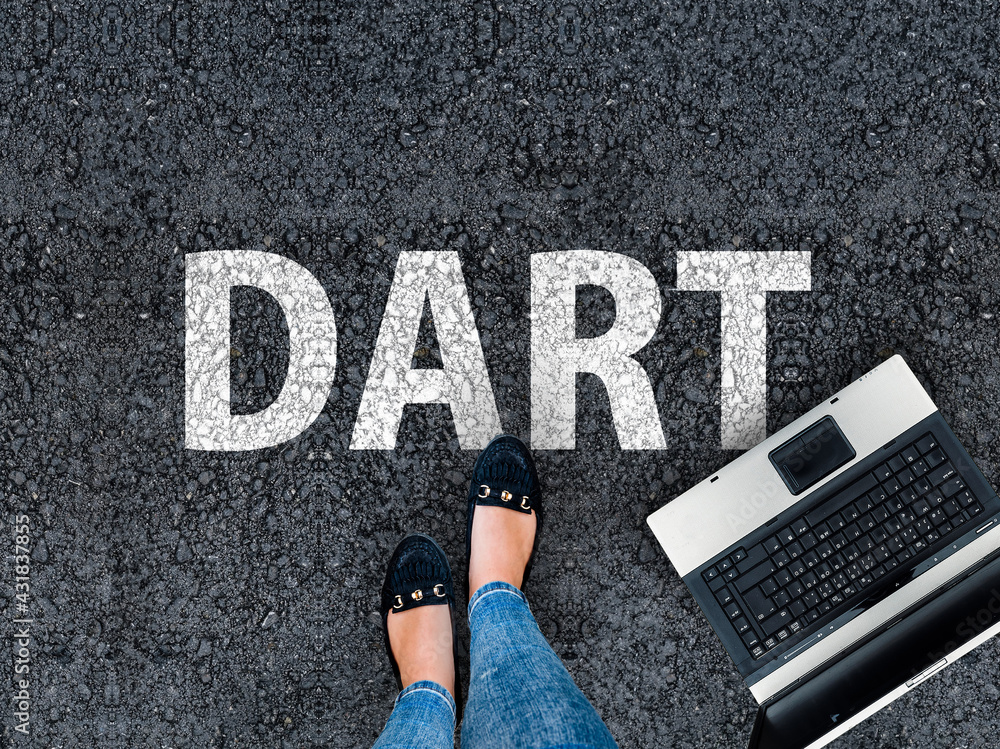 Aufkleber dart programming language. legs in sneakers standing next to laptop and word dart