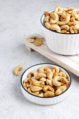 Kacang mede or mete, Fried cashew nut is a snack from Indonesia usually served on Eid al-Fitr.  its nuts are dried and then fried in a variety of flavors.