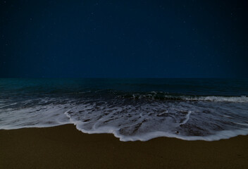 Stars on a beach in Tuscany, Italy at night
