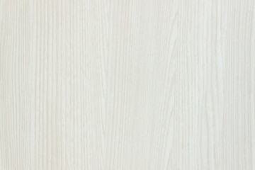A light wooden wall background. 