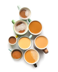 Cups of tasty coffee on white background
