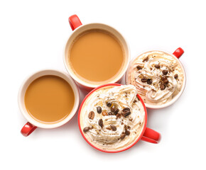Cups of tasty coffee on white background