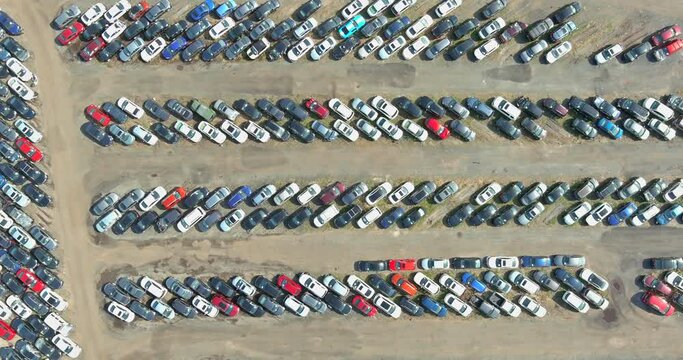 Rows a many used cars parking auction lot terminal parked
