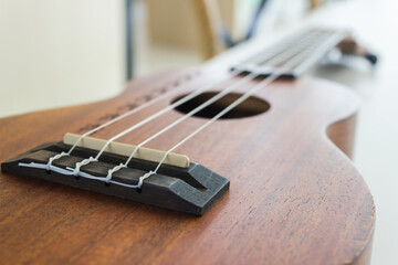 An acoustic guitar close up.