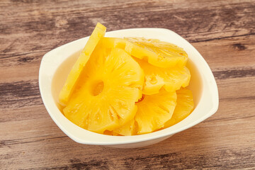 Marinated pineapple rings in the bowl