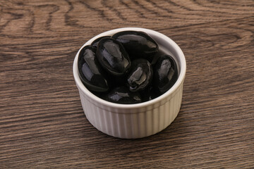 Pickled black olives in the bowl