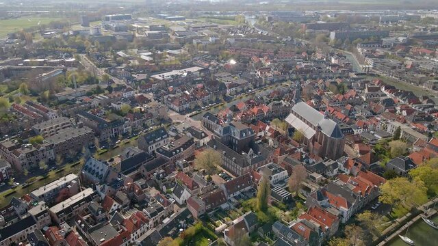 Weesp small city in North holland, The Netherlands, city view along the water aerial drone footage.