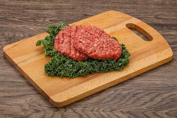 Raw beef burger cutlet for cooking