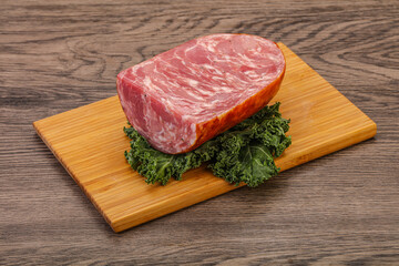 Beef ham piece over board