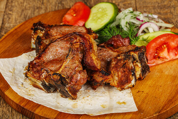 Grilled lamb barbeque served vegetables