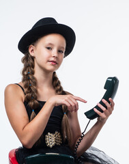 communication. child having phone conversation. happy childhood. beauty and fashion.