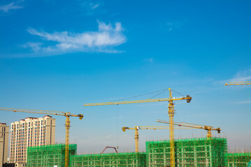 the construction worker's tower crane, Residential buildings are under construction