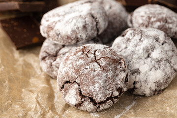 Chocolate cookies powdered with sugar close up