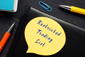  Financial concept meaning master business administration Restricted Trading List with phrase on the sheet.