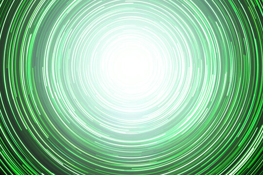 Neon circle lines with empty copy space inside isolated on black background. Colorful led lights long exposure rotation photo. Bright shiny light. Cosmos space planet abstraction. Green vortex spiral.