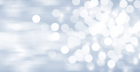 White circle light on gray smooth backdrop or silver snowflake background. 