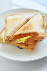 Toast on a white plate on a white background