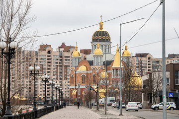 View to the St. Pokrovskiy Cathedral or Cathedral of the Intercession on Obolon embankment in Kyiv, Ukraine