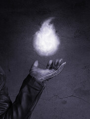 Levitating magic fire flame on a special glove