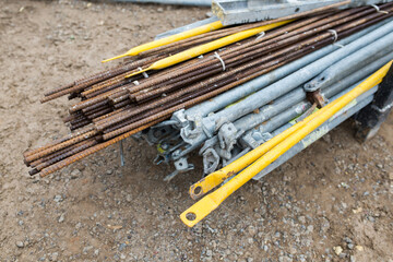 Details of scaffolding with reinforcement rods before installation on the construction site