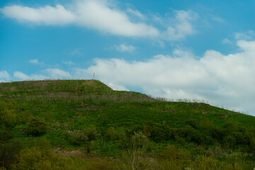Fototapeta premium green mountain against the sky