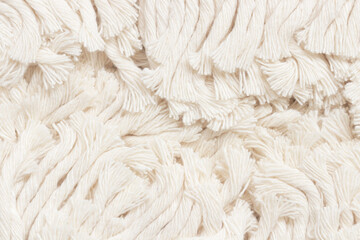 Close-up white fabric texture of cotton mop for background