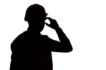 silhouette of man in hard hat on isolated background put on protective glasses, head of contruction...