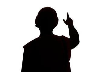 silhouette back of young construction worker in hard hat on isolated background showing with hand direction forward, goal concept,foreman controls work