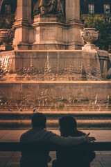 Lovers in front a fountain