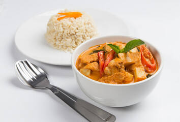 Red curry with chicken and bamboo shoots, eaten with brown rice