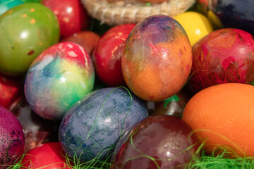 Fototapeta na wymiar Close-up of colored Easter eggs in multicolored toppings