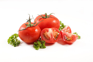 red tomato and herb isolated on white