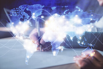 Double exposure of business theme drawing over people taking notes background. Concept of financial world