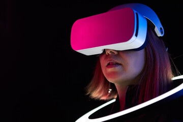 Woman is using virtual reality headset.