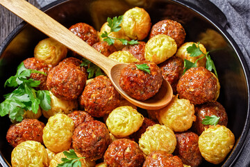 Meatballs and spaghetti balls top view, close-up