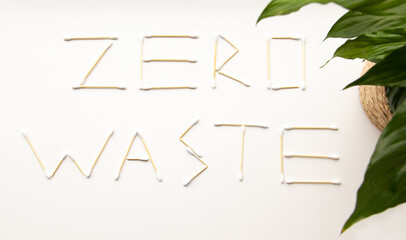 Ecological concept. Lettering zero waste made from wooden cotton swabs