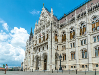 Budapest, Hungary - August 31, 2019: majestic facade of the Hungarian Parliament building, built in the neo-Gothic style. Famous state building and most popular tourist attraction in Budapest	