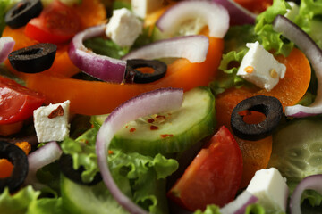 Delicious greek salad on whole background, close up