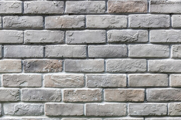 White brick wall background in rural room. Abstract weathered texture stained old stucco light gray. White grunge brick wall background. Misty brick wall for background or texture.