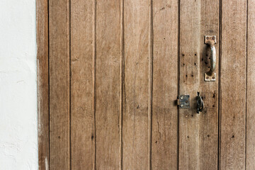 An old wooden door texture for background. 