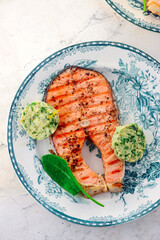 Trout steak with sorrel butter.top veiw .style vintage