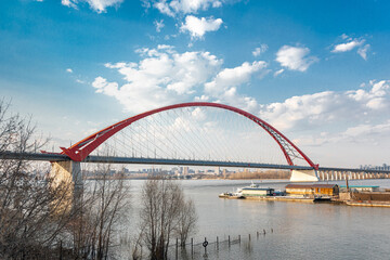 Fototapeta na wymiar Novosibirsk, Russia - April 30, 2021: Bugrinsky bridge under the blue sky